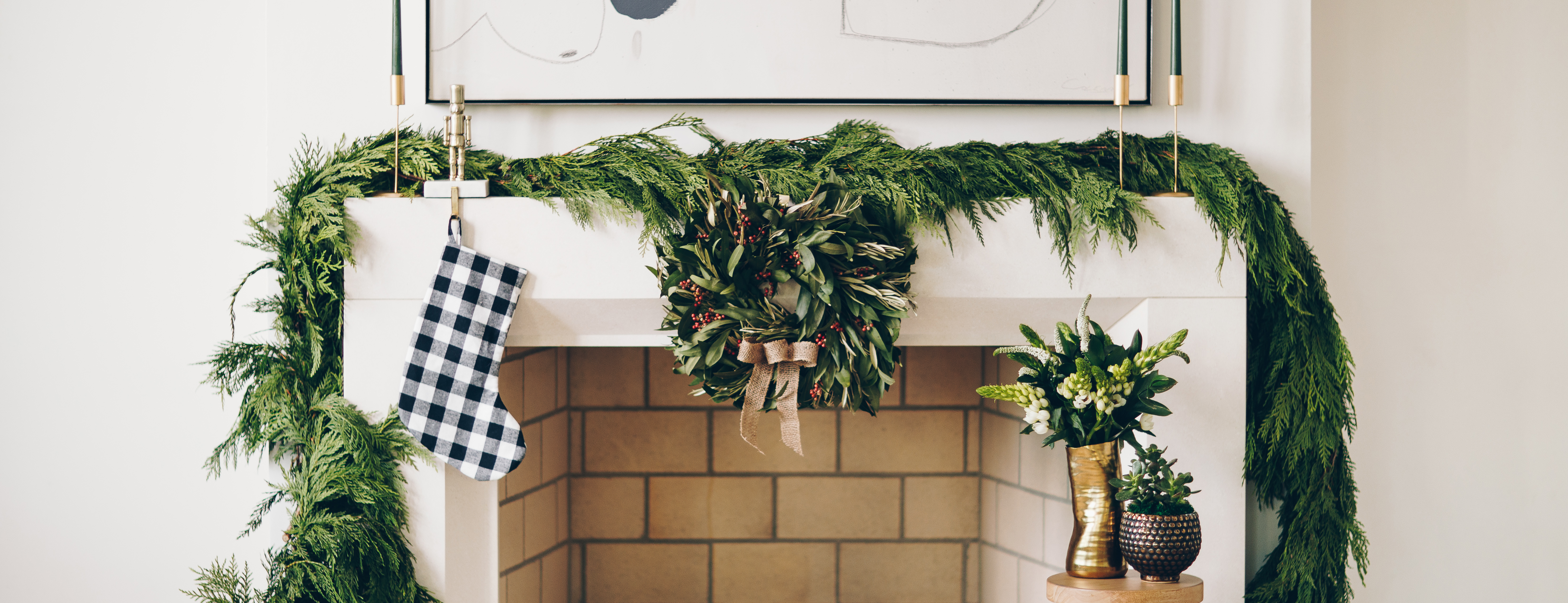 Holiday wreath adorning a mantel 